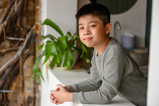 Portrait of asian boy in long sleeve shirt
