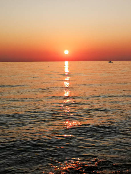 istock Sunset on the sea. Red sky 1290094247