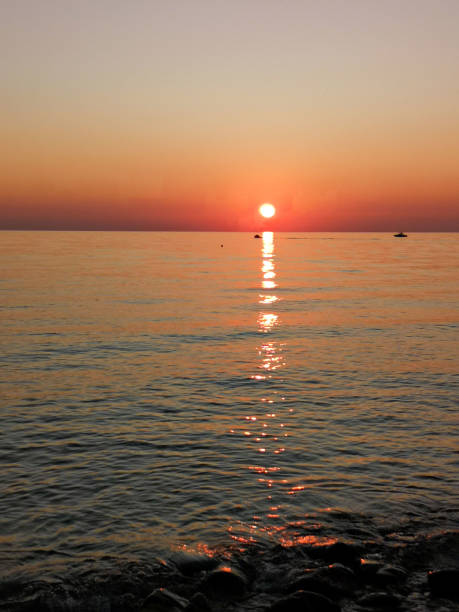 istock Sunset on the sea. Red sky 1290094248