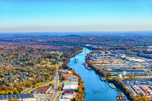 The Cumberland River in Tennessee with business and industry along its banks from an altitude of about 1000 feet.