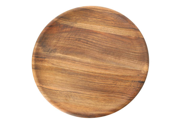 istock Wooden kitchen board isolated on white background 1290096286