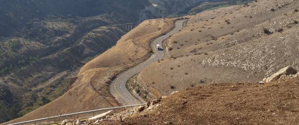 istock Winding road at Golan Heights border with Jordan. 1290098284