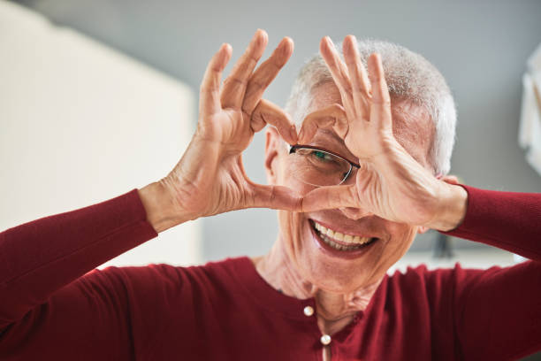 istock Senior woman sending love 1290098948