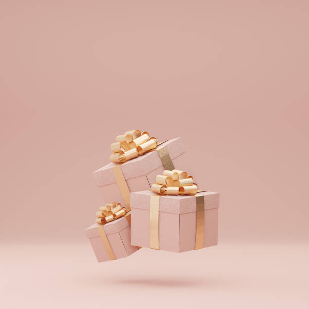 3d 粉紅色禮品盒與金絲帶蝴蝶結懸浮在柔和的粉紅色背景。飛行禮物抽象廣告為婦女。創意逼真的最小禮物。具有文本複製空間的橫幅。3d 渲染 - 禮物 個照片及圖片檔