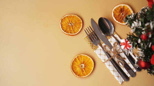 istock Setting for festive Christmas dinner on gold table with decoration 1290099489