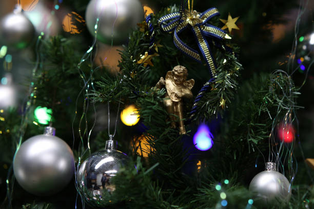 istock Beautiful bright toys hang on the tree 1290101493