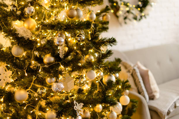 istock Beautiful holdiay decorated room with Christmas tree with presents under it 1290103237