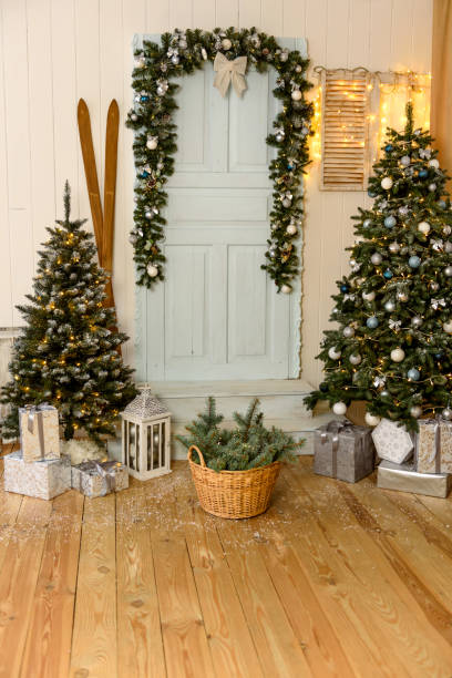 istock Beautiful holdiay decorated room with Christmas tree with presents under it 1290103257