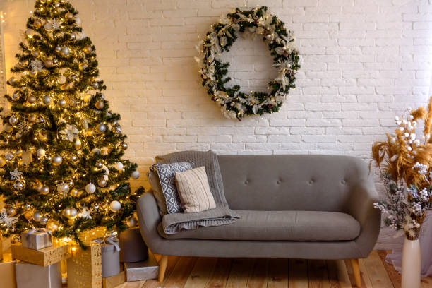 istock Beautiful holdiay decorated room with Christmas tree with presents under it 1290103280