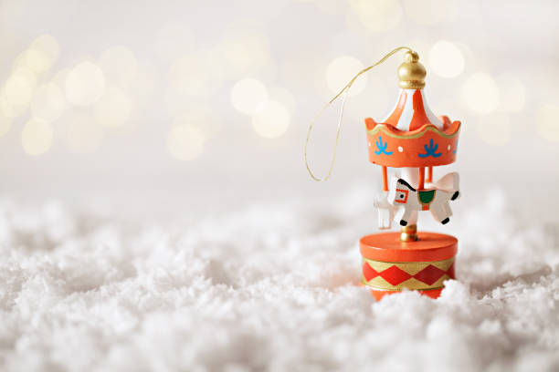Christmas decoration carousel horse bauble. Space for text. Selective focus
