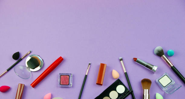 istock lots of makeup on a purple background 1290109780
