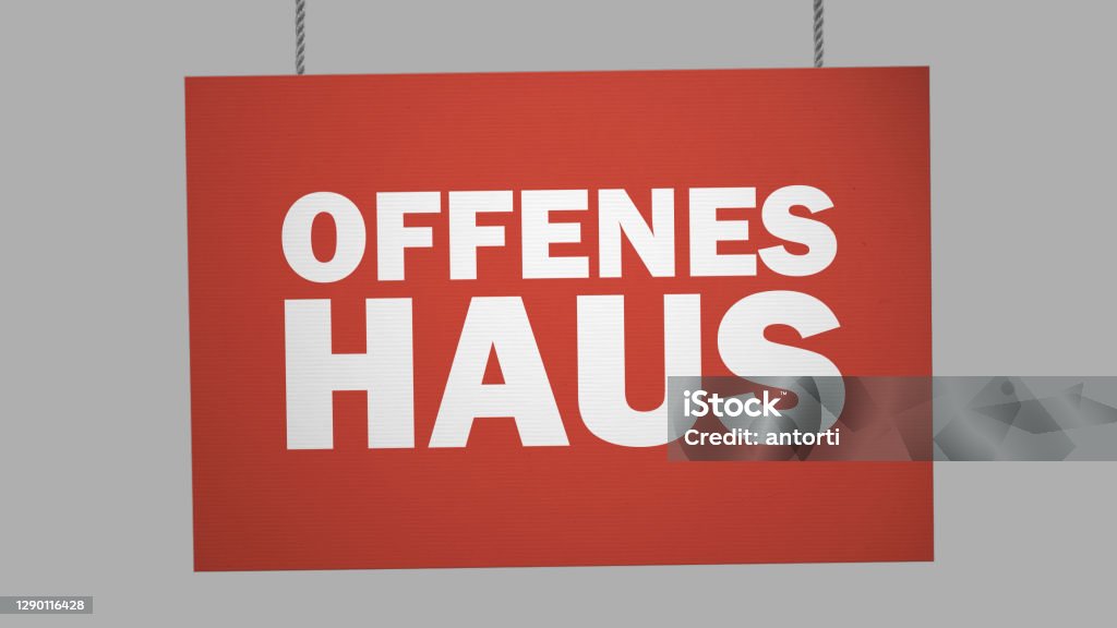 Offenes haus (open house) German cardboard sign hanging from ropes. Clipping path included so you can put your own background. For Sale Sign Stock Photo