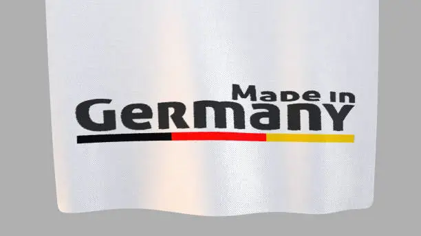 Photo of Made in Germany unfolding cloth sign. Clipping path included so you can put your own background.