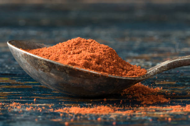 istock Paprika on a Vintage Spoon 1290117401