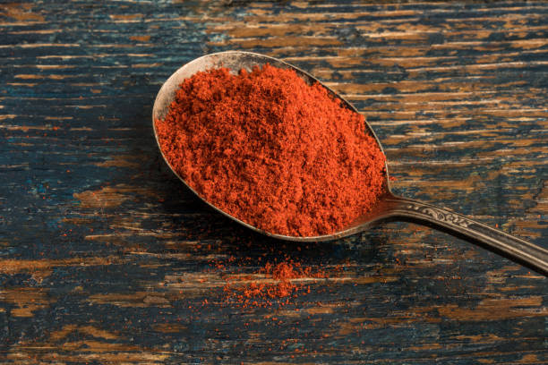 istock Smoked Paprika on a Vintage Spoon 1290118334