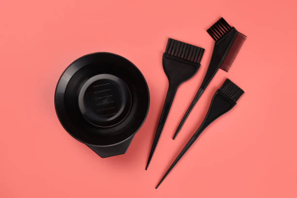 istock professional set for hair coloring, bowl, brushes, combs 1290118396