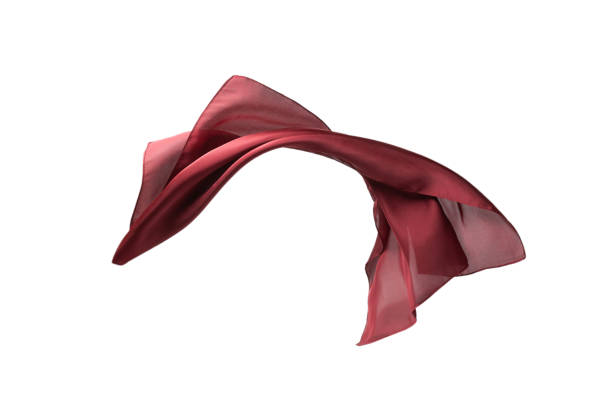 istock Flowing red silk scarf isolated on white background. 1290119748