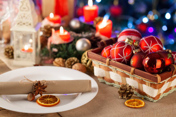istock Christmas table setting. Holiday Decorations on rustic wooden table. 1290120808