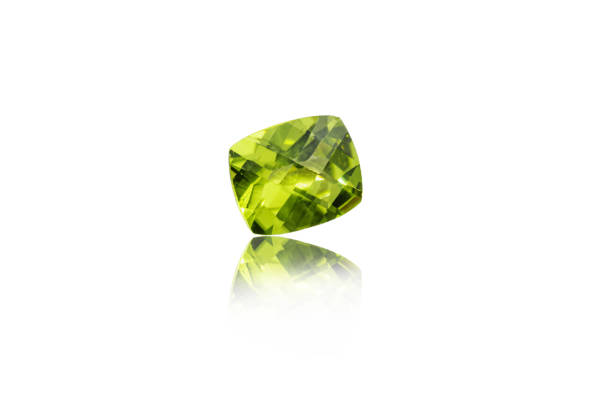 istock macro mineral stone cut Peridot on a white background 1290120847