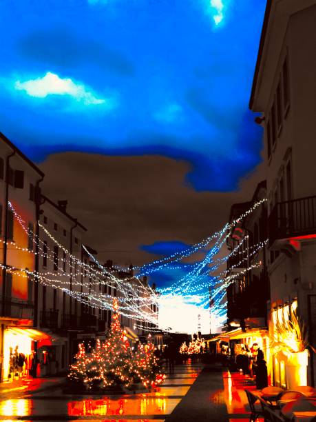 istock rain in the street illuminated by Christmas lights 1290121001