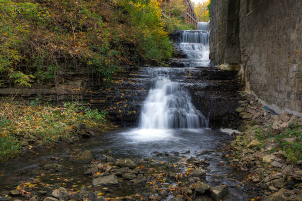 istock Lower Mill Falls in Ontario, Canada 1290122885