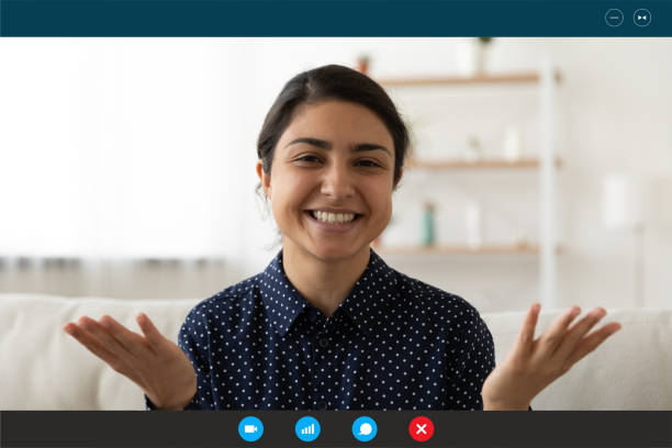 istock Head shot portrait screen view smiling Indian woman teacher explaining 1290123064