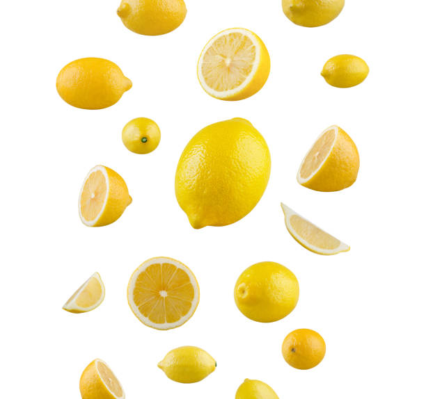 istock Falling delicious lemons on white background 1290123775