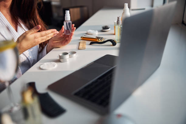 istock Competent blogger doing online review on her cosmetics 1290130322