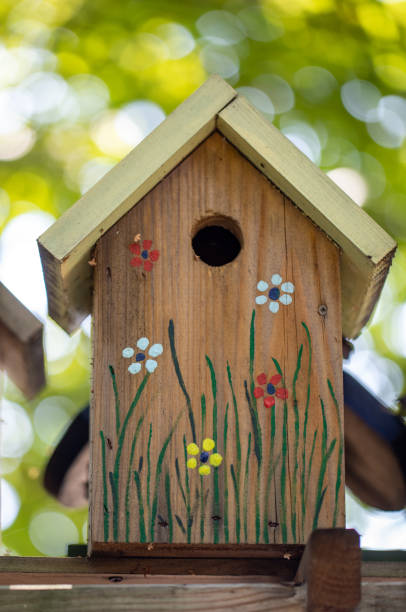 istock Old decorative wooden birdhouse 1290131092