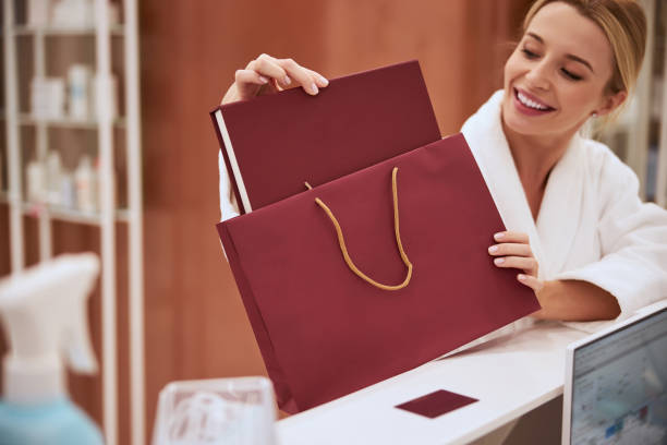istock Pretty Caucasian woman rejoicing at her present 1290133410
