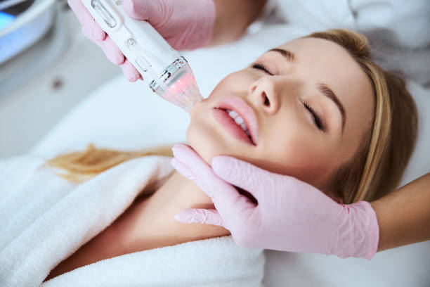 istock Good-looking woman patient lying still during the treatment 1290133521