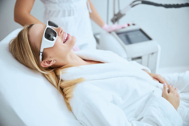 istock Cheerful woman client anticipating a beauty procedure 1290133581