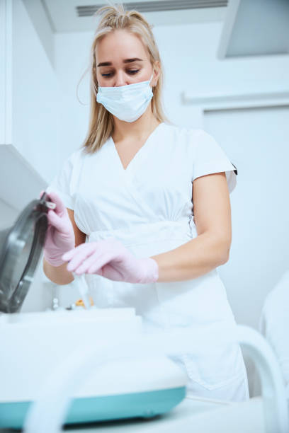 istock Dermatologist preparing the serum for a treatment procedure 1290133582