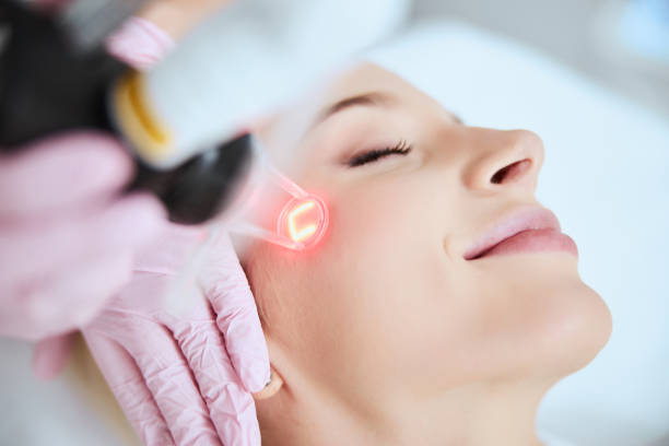 istock Calm pleased lady undergoing a cosmetic procedure 1290133597