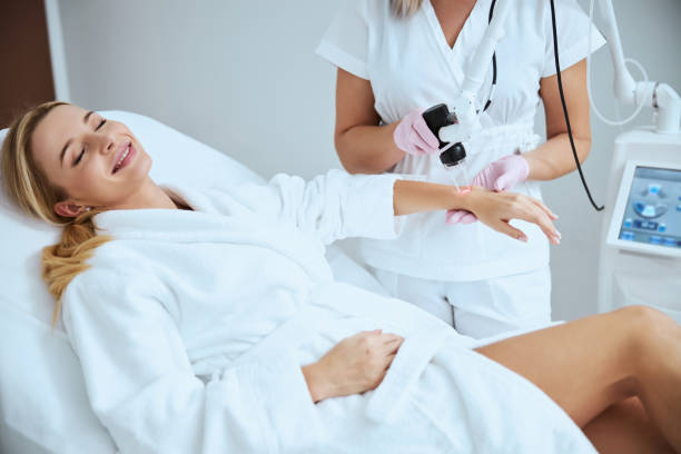 istock Blonde lady smiling during the cosmetic procedure 1290133638