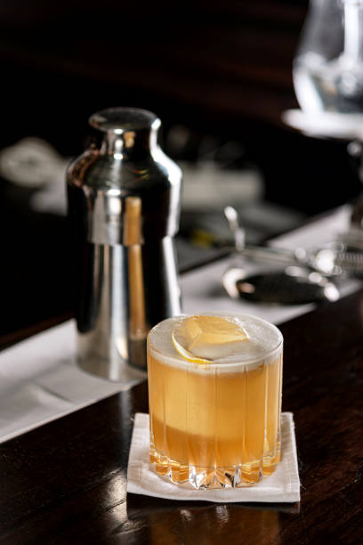 istock Fresh summer cocktail with ice and orange peel 1290138197