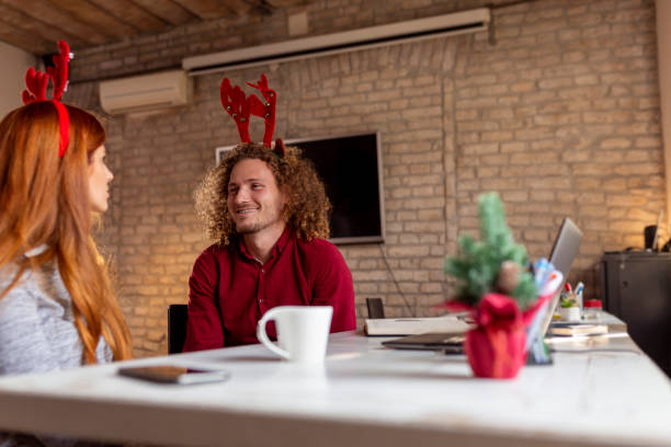 istock Business people taking coffee break around Christmas 1290146963