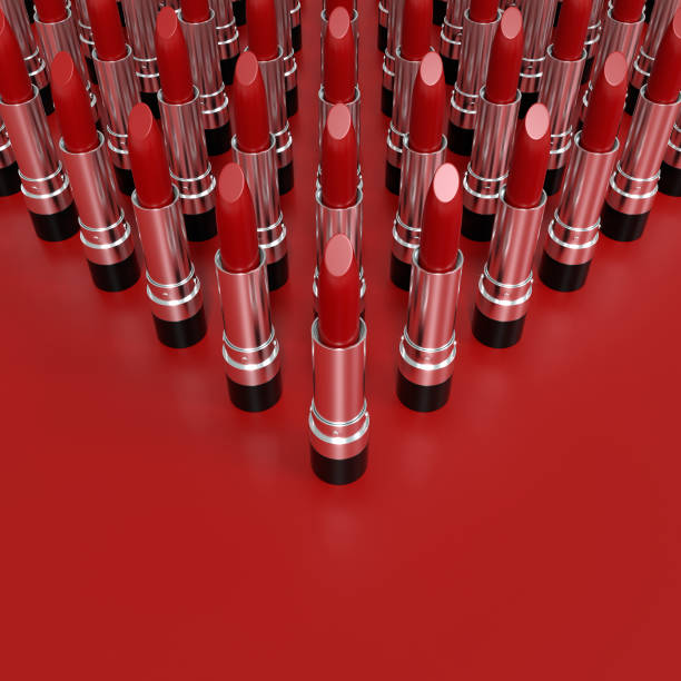 istock Creative presentation of red lipsticks at an angle on a red background. 3d illustration. Glamorous accessories. 1290148316