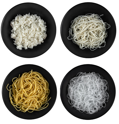 Set of four main dish of asian restaurant isolated on a white background, Cellophane or glass noodles, yellow yakisoba noodles, rice noodles, White rice