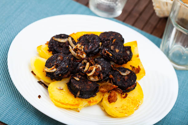 istock Blood sausages served with potato and onion 1290154595