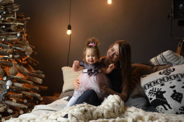 istock Mother and daughter have fun together before christmas. 1290156190