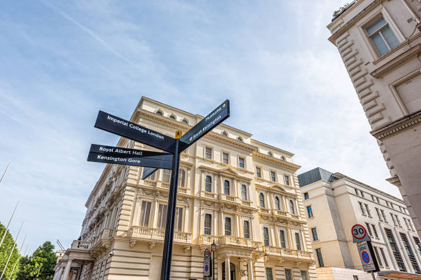 Direction informational sign to Imperial College, Museums Royal Albert Hall and Gore in Chelsea London, UK - June 24, 2018: Direction informational sign to Imperial College, Museums Royal Albert Hall and Gore in Chelsea and Kensington borough royal albert hall stock pictures, royalty-free photos & images