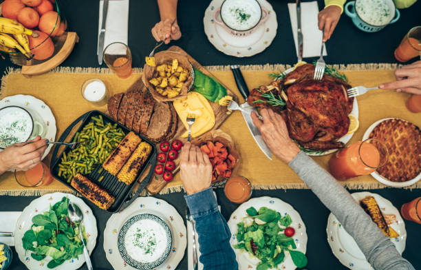 istock Overhead view of table during Christmas dinner 1290159734