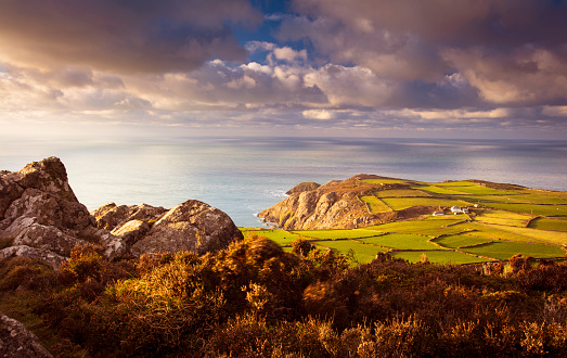 Rocky coastline in Pembrokeshire at sunset, Wales