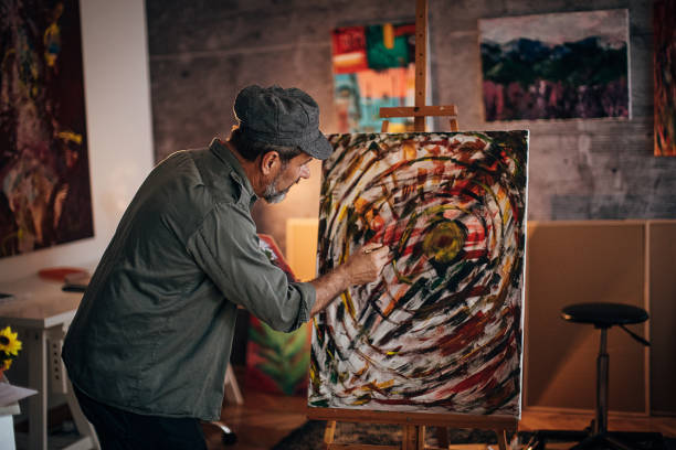 istock One painter painting late into the night in his studio 1290162291