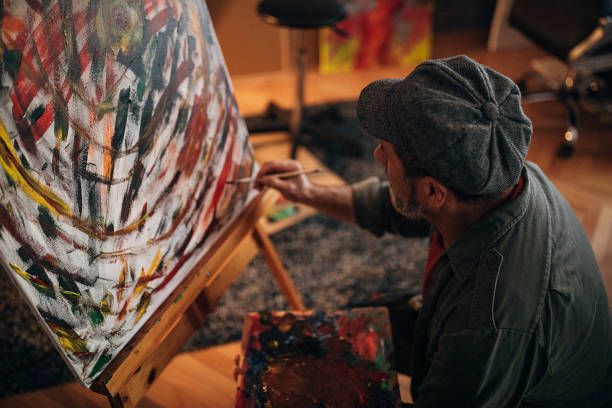 istock One artist painting late into the night in his studio 1290163005