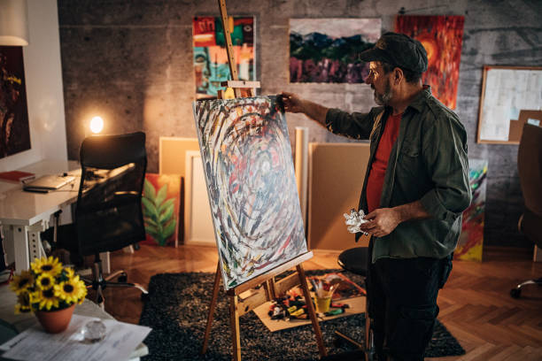 istock One senior man finished painting in his studio 1290164032