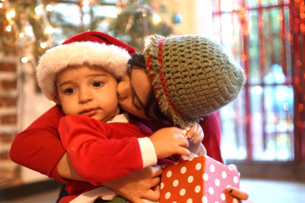istock brothers at Christmas 1290168905
