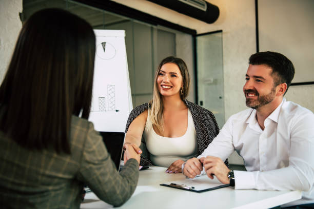 istock Successful businesswoman shaking hands with female client 1290169569