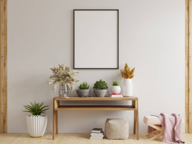 istock Mock up poster frame on cabinet in interior. 1290177550